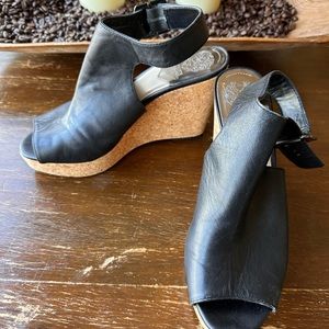 Vince Camuto black leather cork with sling back buckle.